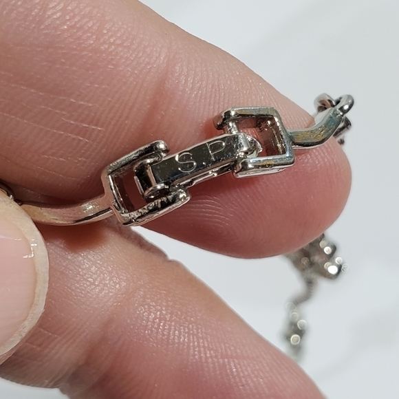 Vtg S.P signed (Avon?) Silvertone floral and wave Rhinestone necklace 18" - Picture 2 of 8